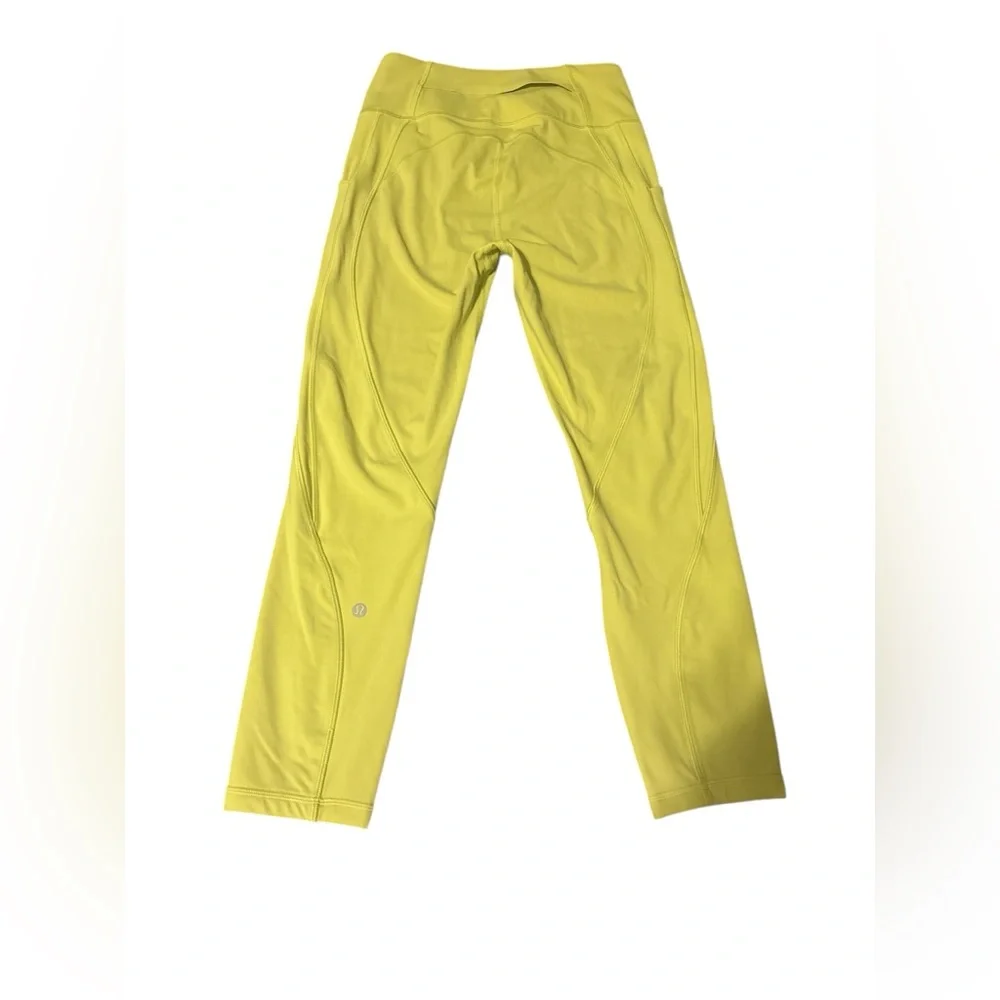 Lululemon Fast and Free Nulux leggings in golden lime